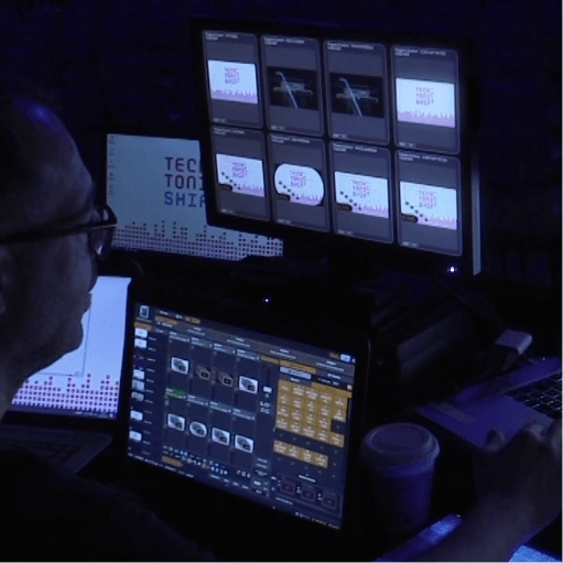 An image showing an AV technician working on an event